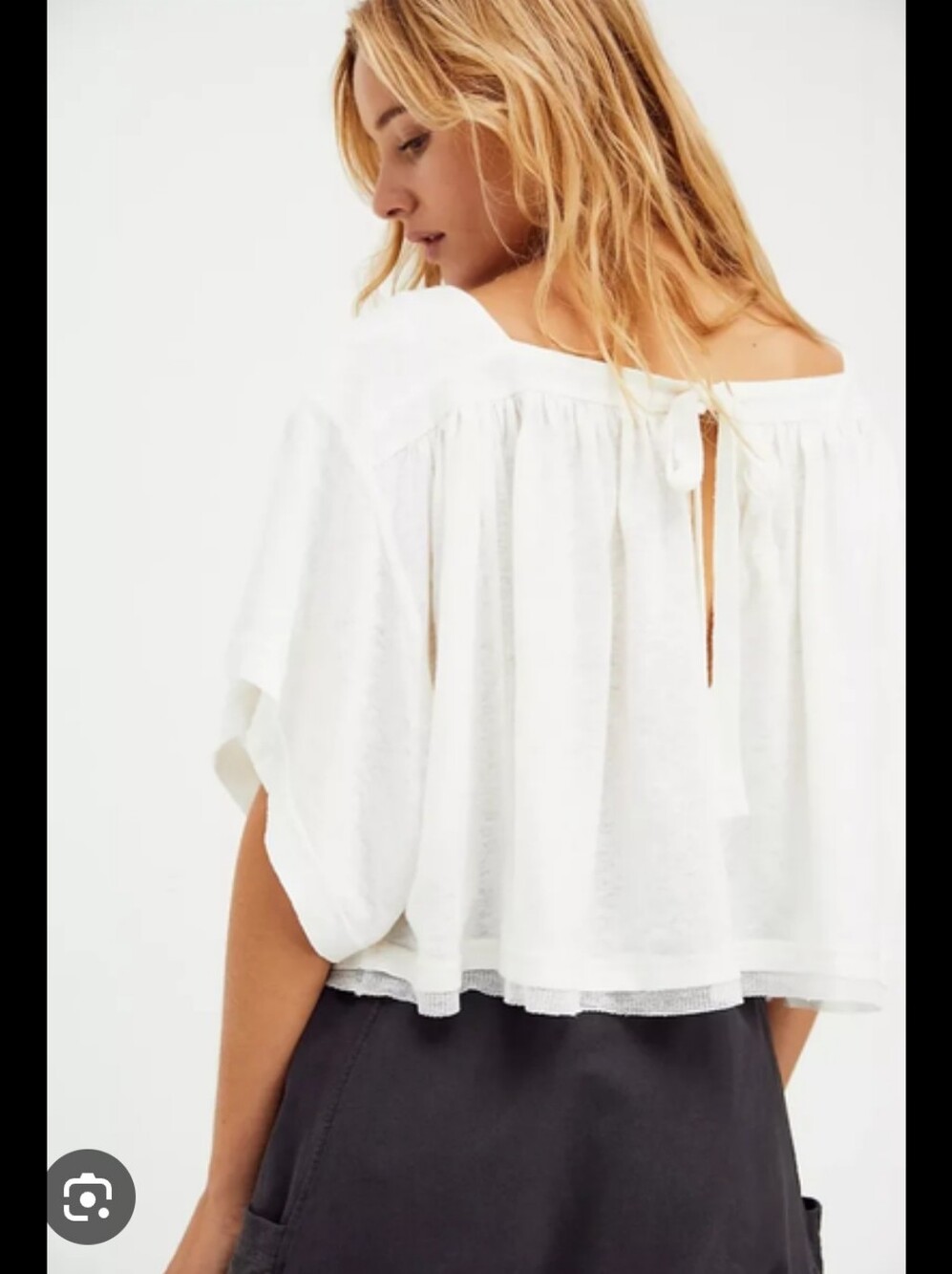Free People Sunsetter Tee in alabaster with dolman sleeves and a tie back detail